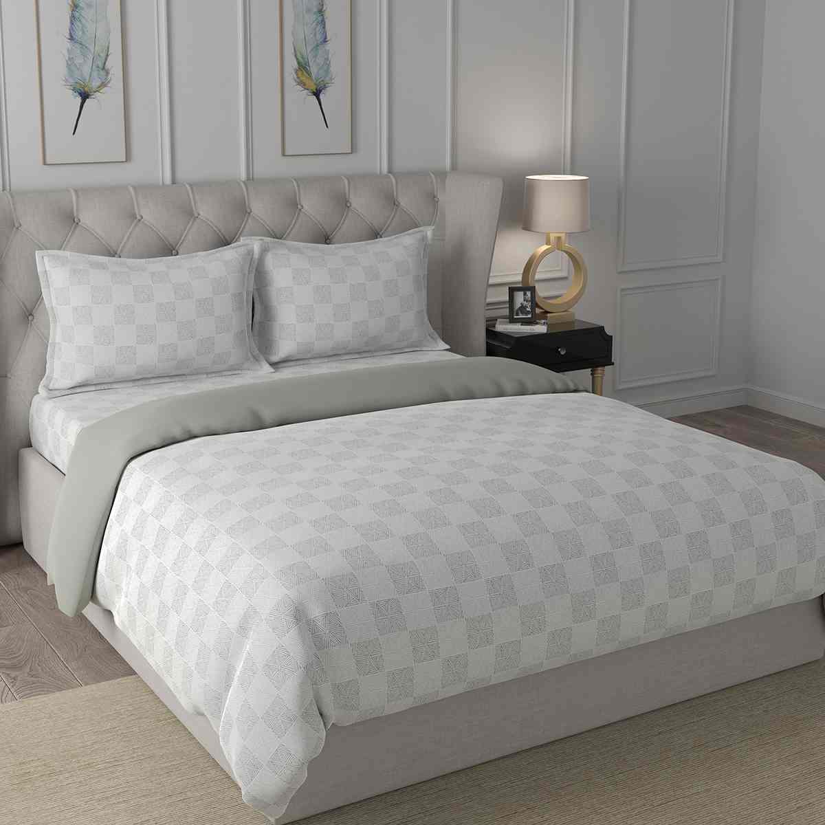 Grey quilted bed discount