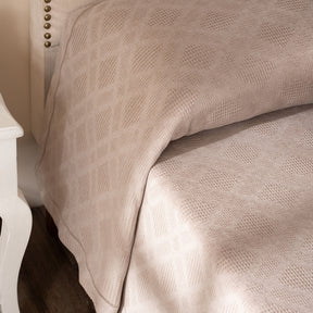 Ornamental Elegance Flip Flop Self Texture Beige Bed Cover/Bed Spread