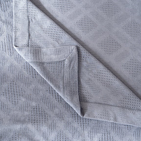 Ornamental Elegance Flip Flop Self Texture Blue Bed Cover/Bed Spread